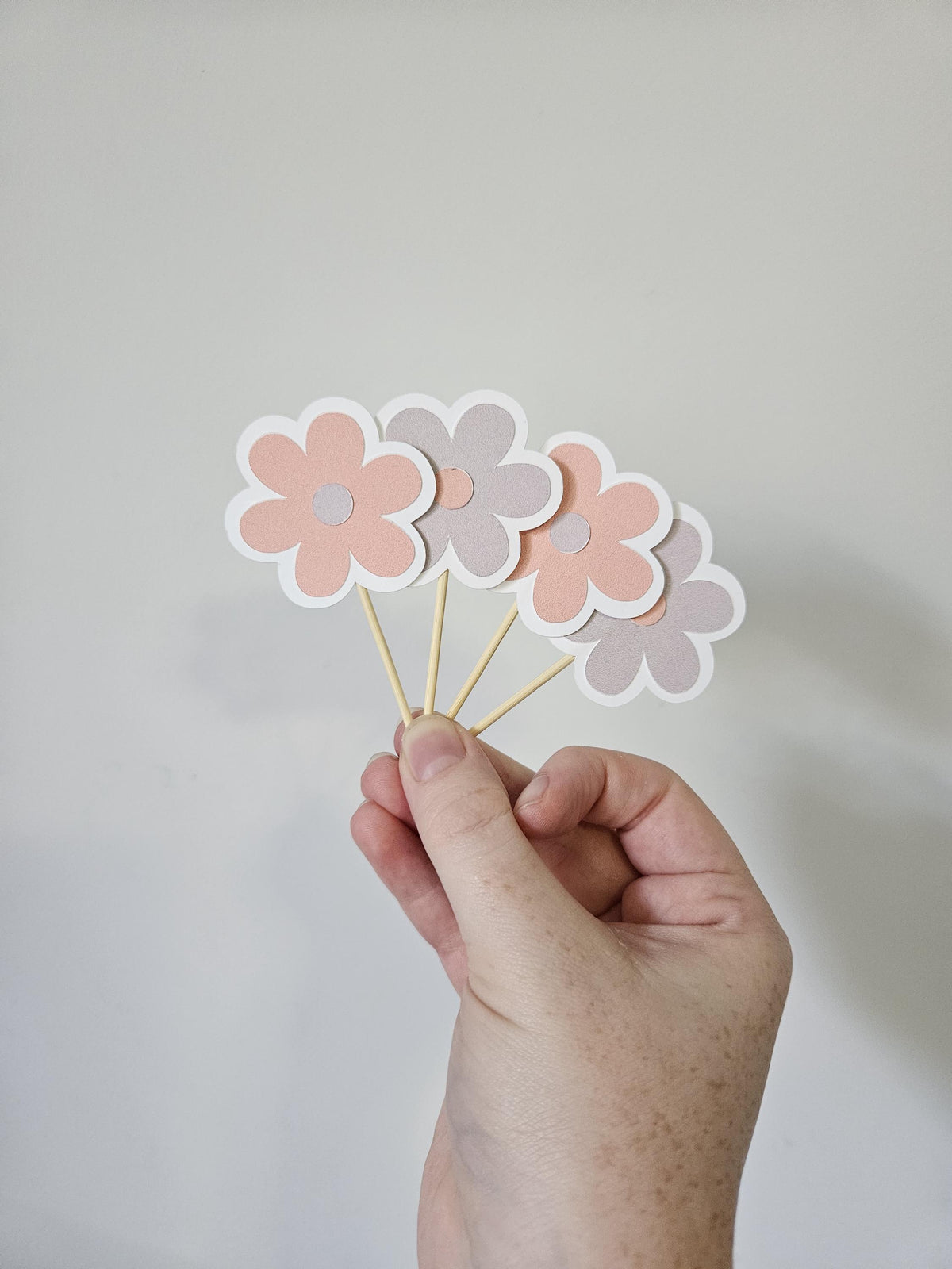 pink and purple cake topper