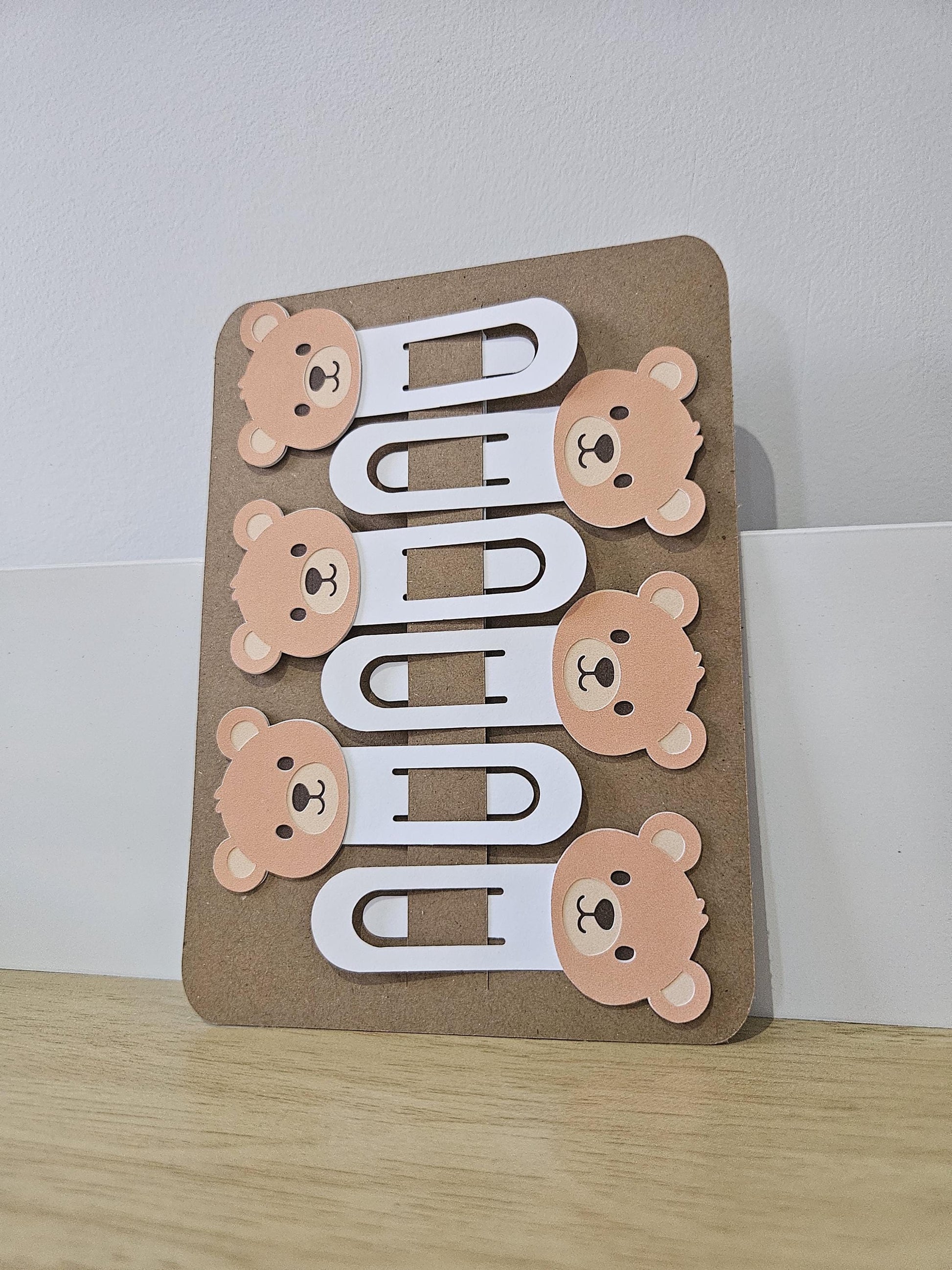 down angled view of 6 pack of brown bear cardstock bookmarks
