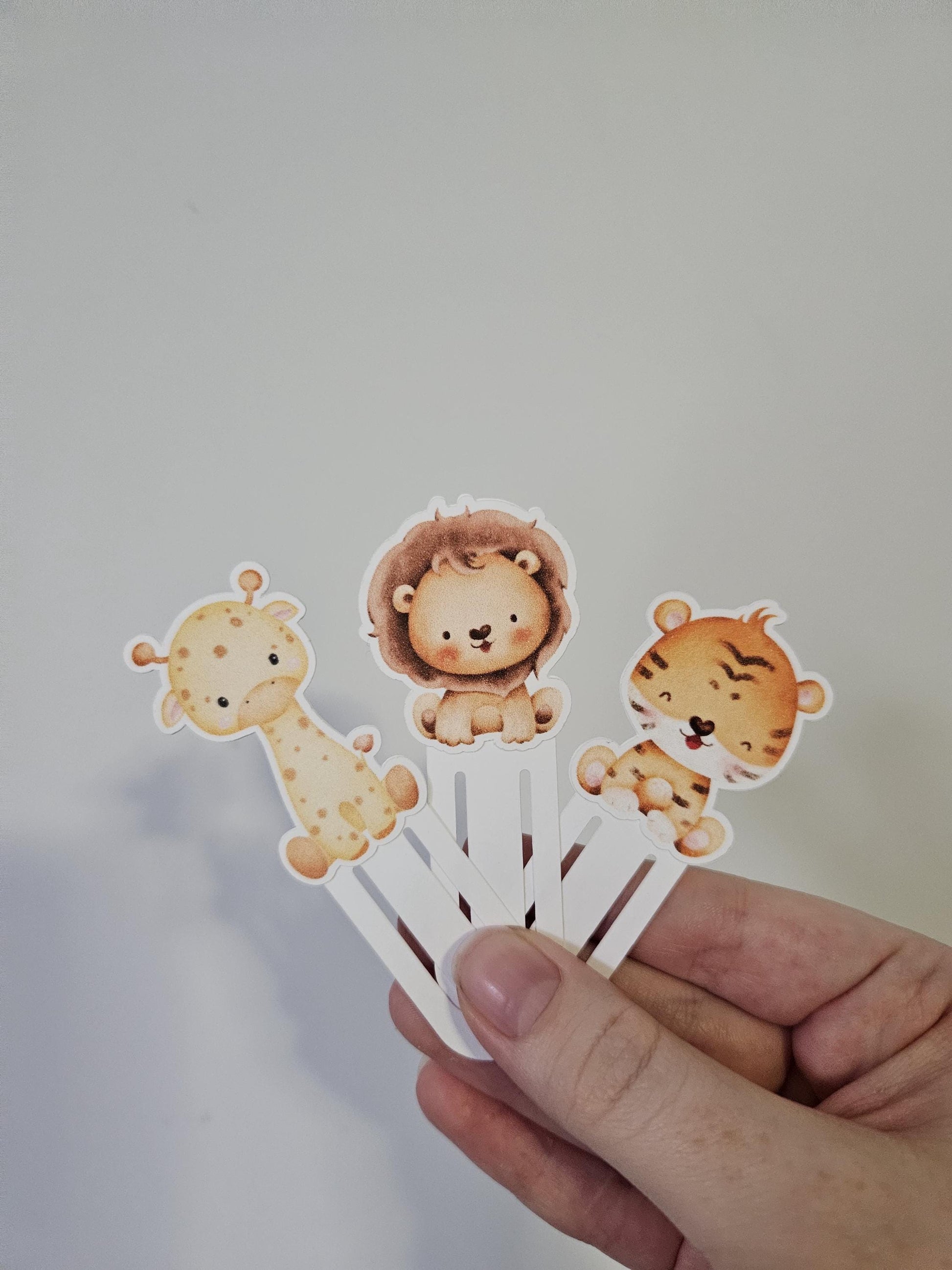 3 bookmarks marks lion, giraffe and Tiger on white background
