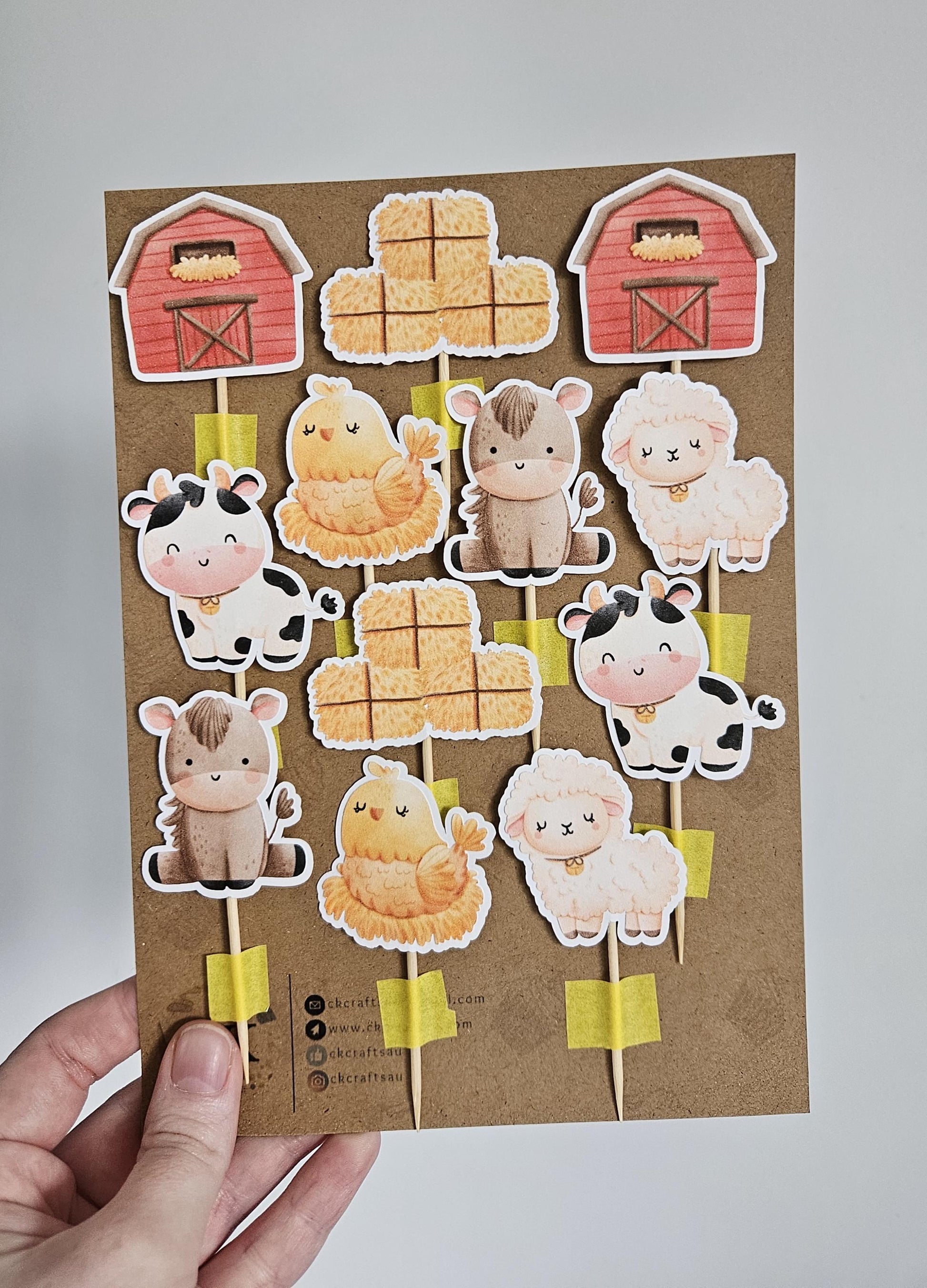 12 pack displayed of farm animals and farm objects.